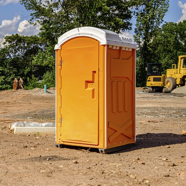 what is the cost difference between standard and deluxe portable restroom rentals in Bryan County